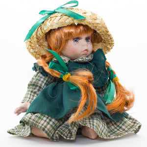 ポーアンネ人形に座っているリルアンネ